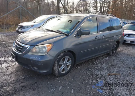 2008 Honda Odyssey Touring z USA, uszkodzony, nr VIN 5FNRL38948B112218